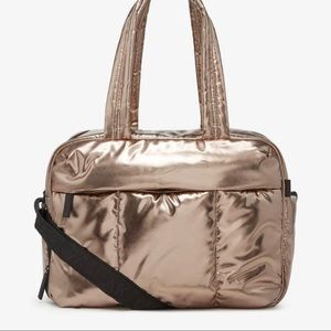 ISO this Calpak Luca Duffel in Bronze and new or very light usage.